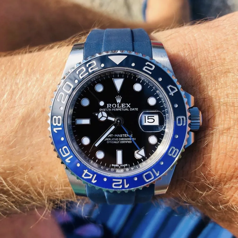 Aftermarket strap fitted to a luxury watch